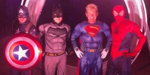 Men in Vander Superheroes costumes